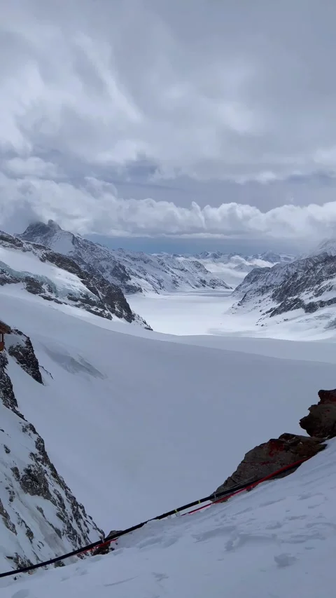 Bird's eye view from the cable car on the top of Jungfrau mountain. 動画素材 274778517