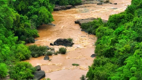 Bird’s eye view captures muddy floodwaters. Stock Footage 310707905
