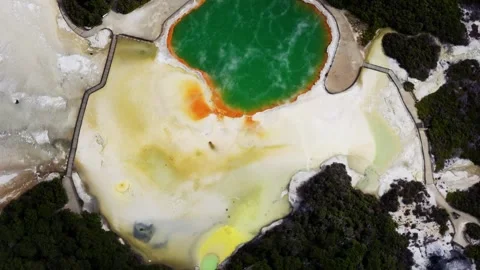 Bird's eye view of the Champagne Pool geothermal reserve in Rotorua, Bay of Stock Footage 343842560