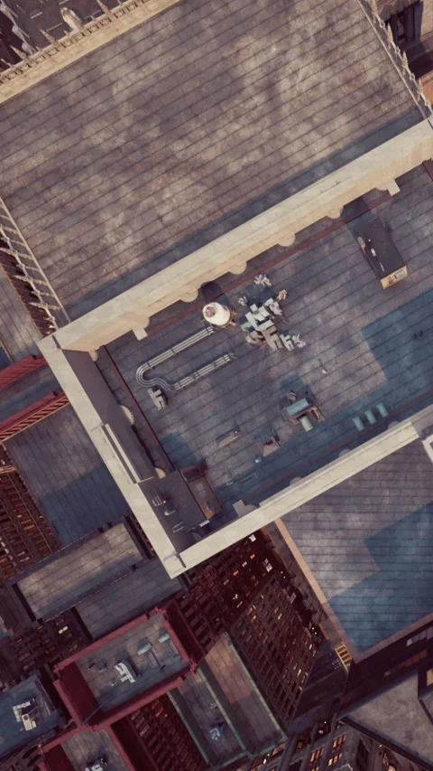 Birds eye view of city rooftops with various buildings and structures Stock Footage 343154461