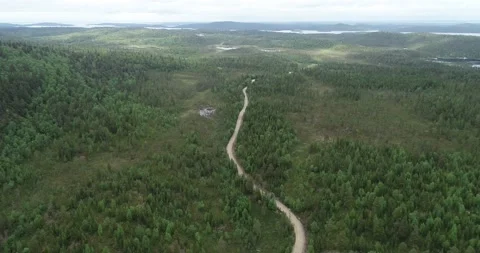 Bird's eye view of curvy empty road in Lapland. Stock Footage 147862896