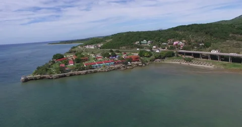 Bird's-eye view from drone to landscape of peninsula, bridge with main city road Stock Footage 68074891