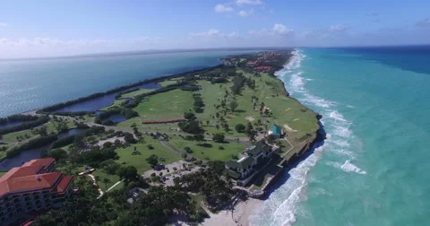 Bird's-eye view from drone to landscape of peninsula, extensive field with green Stock Footage 68077261