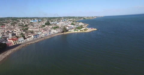 Bird's-eye view from drone to landscape of peninsula, main road, local houses, Stock Footage 68078809