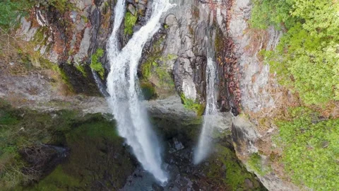 Bird's-Eye View Drone Shot of a Powerful Waterfall Plunge Pool Stock Footage 336589346