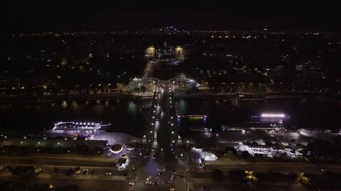 Birds Eye View From Eiffel Tower At Night, Traffic Cruises By On River Seine Video stock 71749491
