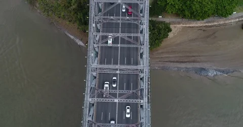 Birds eye view flyover of traffic on Story Bridge by drone Video stock 76561600