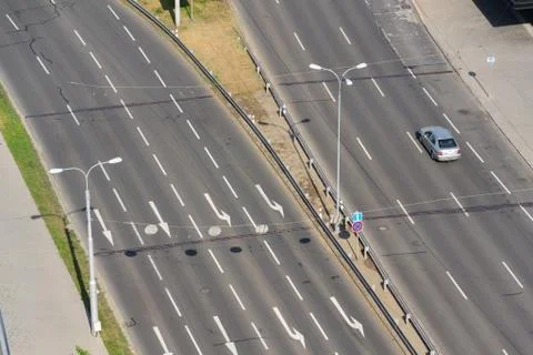 Birds eye view of half-empty road with cars, driverless technology concept 写真素材