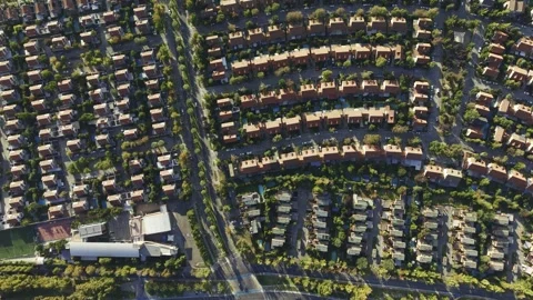 Bird's-eye view of a high-density residential neighborhood with uniform Stock Footage 332561148