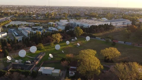 Bird's eye view of the many white parabolic antennas of the research Stock Footage 200820053