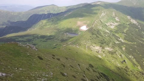 Bird's-eye view of the mountain landscape and highland lake Nesamovyte. Ukraine Stock Footage 101851045