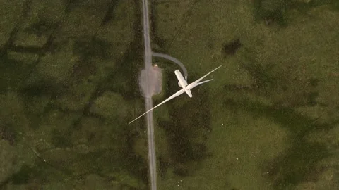 Birds eye view of moving wind turbine. Stock Footage 157322938