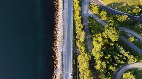 Birds eye view of ocean side road Stock Footage 342970651
