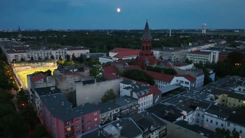 Birds Eye View over Berlin, Germany Neighborhood at night with glowing street Video stock 237526205