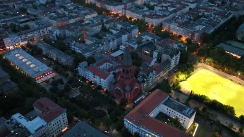 Birds Eye View over Berlin, Germany Neighborhood at night with glowing street Stock Footage 237526658