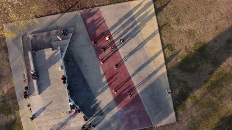 Bird's eye view over a class of tango dancers in a park of the city of Stock Footage 208691462