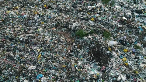 Bird's-eye view over a garbage landfill | Stock Video | Pond5