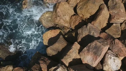Bird's Eye View Over rocks And Sea Water Stock Footage 80626349