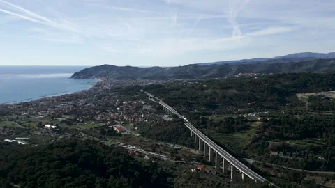 Bird's eye view panoramic of the great highway between the forest trees near the Stock Footage 278938231