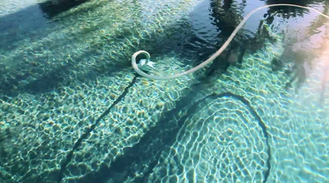 A bird's eye view of a pool vacuum Video stock 33895106