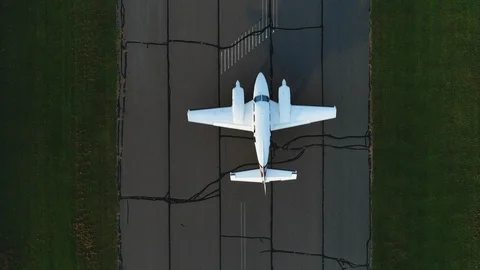 Birds Eye View of Private Jet on Runway before Take Off Stock Footage 100010445