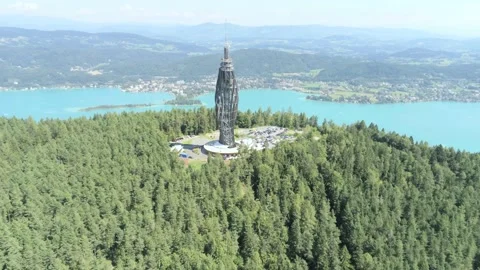 Bird's eye view of the Pyramidenkogel with Woethersee in Carinthia, Austria Stock Footage
