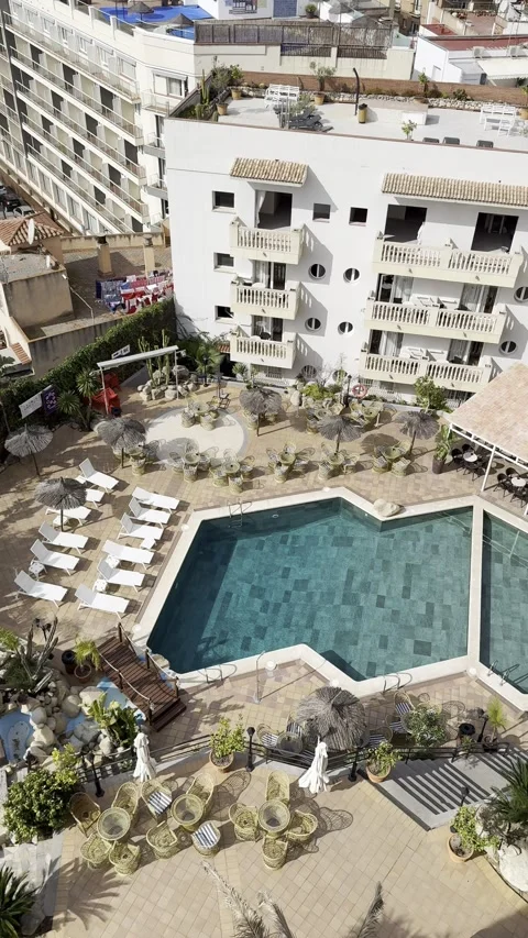 Bird’s-Eye View of Resort Pools from Hotel Room – Scenic Overhead Shot Stock Footage 311055424