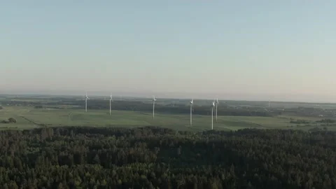 A bird's-eye view of rotating electric windmills. 動画素材 162169622