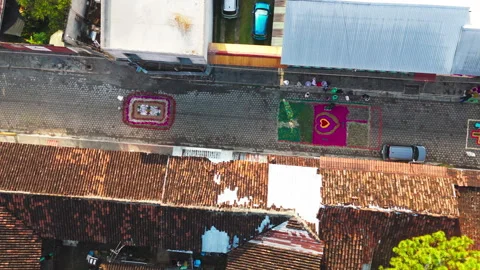 Bird's Eye View Sand Murals on road during Easter Parade Video stock 333690432