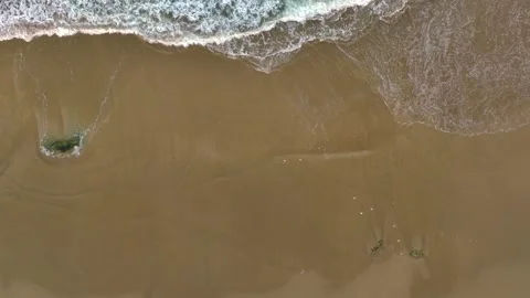 Bird's Eye View Of Sandy Beach With Foamy Ocean Waves Stock Footage 263038154