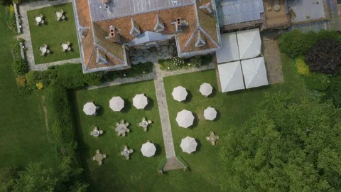 Birds eye view on seating area outside stately home, drone aerial 4K Stock Footage 101137191