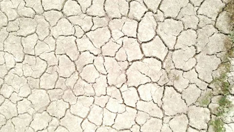 Bird's eye view of severe drought, desertification process, cracked soil Video stock 238424464