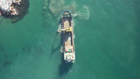 Birds eye view of a ship dredging the sea Stock Footage 232769953