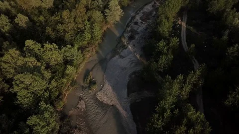 Birds eye view slow river sunset Video stock 111298470