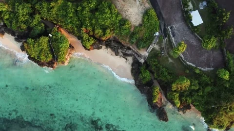 Birds eye view on small beach between cliffs Stock Footage 154026284