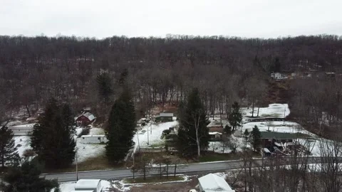 A Birds Eye View of a Small Group of Building Structures with Snow Vidéo 257116785