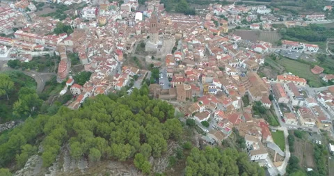 Bird's eye view of small medieval town with bell tower Stock Footage 214111268