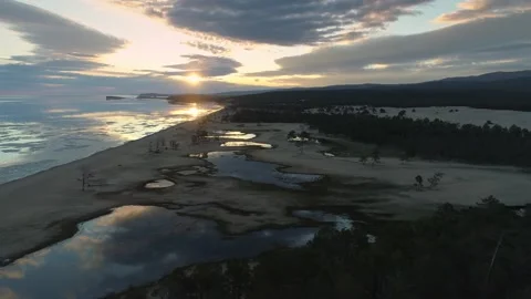 Bird’s eye view spring icy lake Baikal at scenic sunset natural landscape Yarki Video stock 202643598