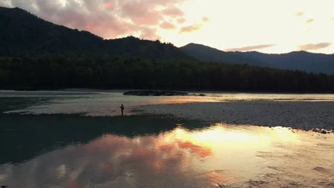 This is a bird's-eye view. Sunset over the river in the Altai mountains Stock Footage 166472343