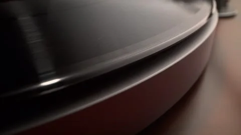 Bird's Eye View of the Surface of a Spinning Vinyl Record Stock Footage 271157489