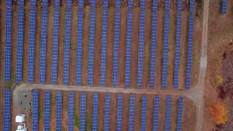 Birds eye view of top down of solar panels installed in a pattern grid. Stock Footage 256069976