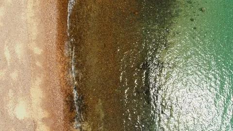 Birds eye view tracking shot over South Australian beach and ocean Stock Footage 124240206