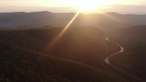 From a bird's eye view. View of the mountains, forest, river and road in Summer 動画素材 147007144
