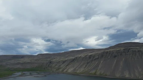 Bird’s eye view of a volcanic mountain with a large lake. Stock Footage 293090139