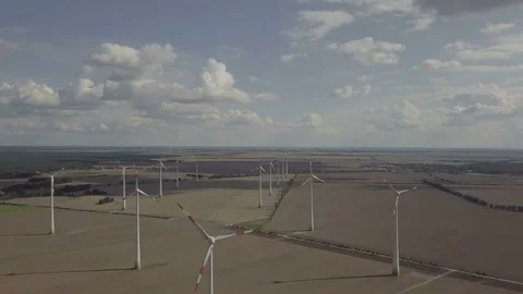 Birds eye view on Windmill field, Energy Production, Renewable Energy AERIAL Stock Footage 83799908
