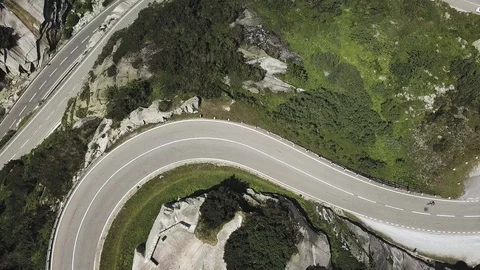 Bird's Eye View of Zigzag Highway Roads in the Middle of Swiss Valley Stock Footage 126356261