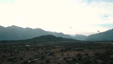 Birds Fly by Aerial View of Cold Mountain Landscape Stock Footage 140611022