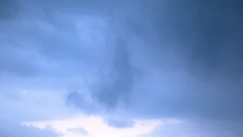 Birds Fly Under the Storm Clouds at Sunset Stock Footage 146205161