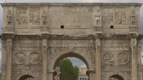 Birds flying in front of Arch of Constantine in Rome Stock Footage 60046944