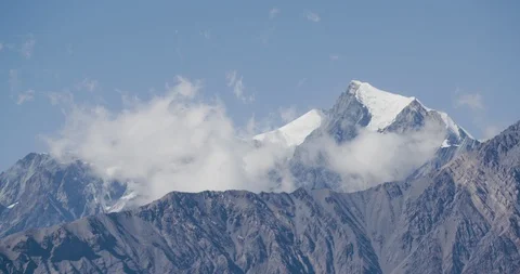 Birds flying over the snow capped Annapurna ranges in Himalaya Stock Footage 145266989
